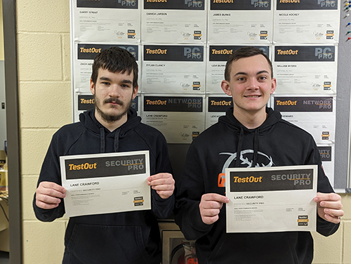 Lane and Levi holding their security pro certifications
